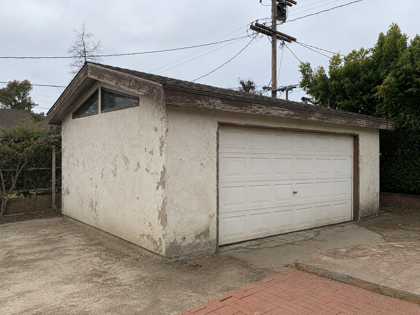 Existing detached stucco garage